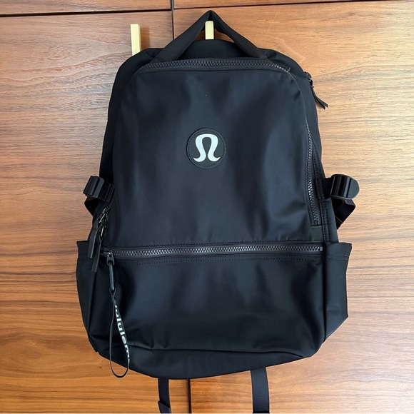 lululemon athletica Handbags - Lululemon New Crew Backpack 22L Black with White Logo